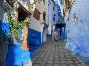 Explore the iconic blue streets of Chefchaouen, Morocco, known for vibrant architecture and cultural charm.